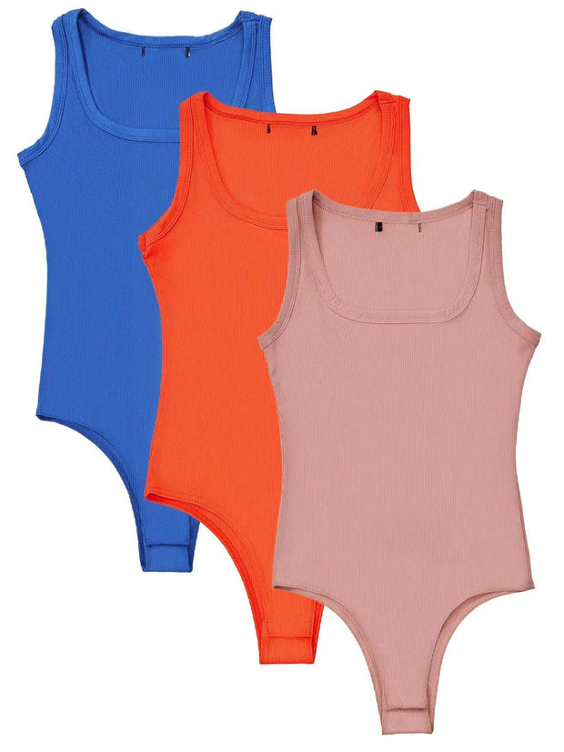 Ensemble de trois bodys femme confortable en bleu, orange et rose pour un look tendance et décontracté