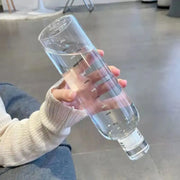 Bouteille plastique écologie transparente pour le suivi de l'hydratation quotidienne