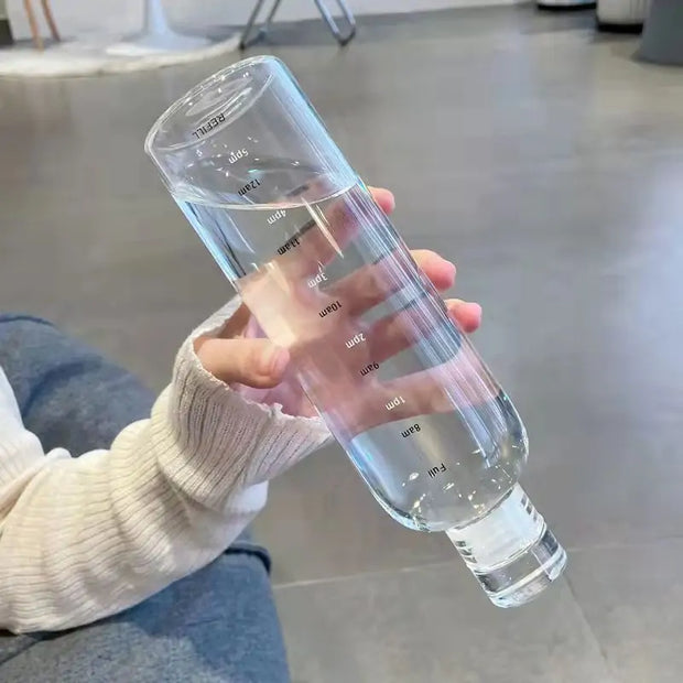 Bouteille plastique écologie transparente pour le suivi de l'hydratation quotidienne