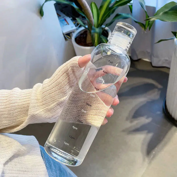 Bouteille plastique écologie transparente avec une capacité de mesure pour un usage quotidien