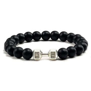 Bracelet pierre volcanique noir avec perles mates et éléments en métal pour une allure élégante