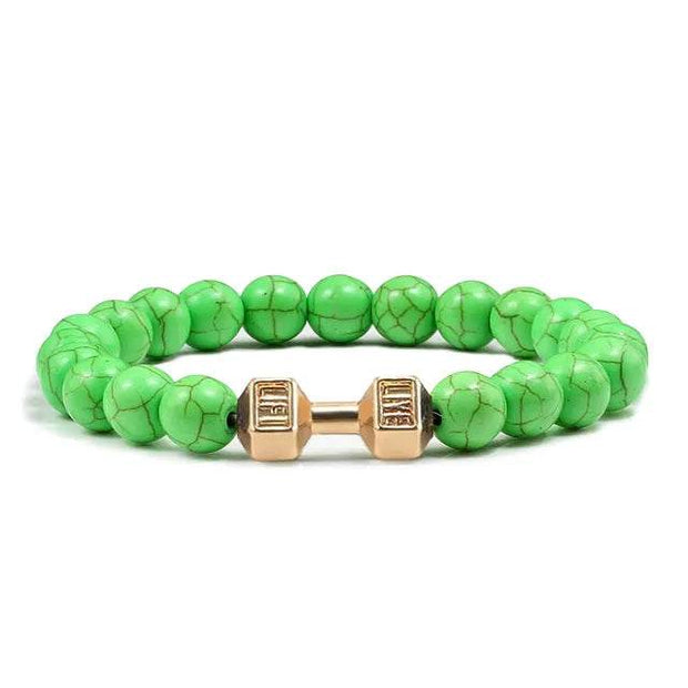 Bracelet en pierre volcanique vert avec détail en métal doré pour un look tendance