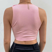 Débardeur femme chic rose avec un design côtelé et une coupe courte pour un style tendance