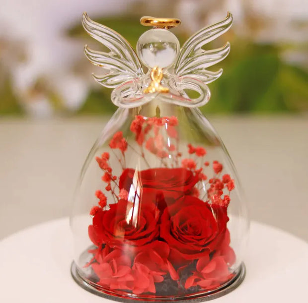 Décoration bouteille en verre fleur séchée avec roses rouges protégées par un dôme en verre