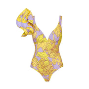 Lavender ruffled swimsuit set with floral pattern and elegant design.