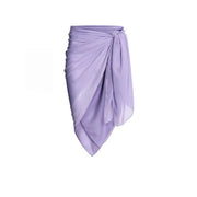 Lavender ruffled swimsuit set, stylish and comfortable for beach or pool.