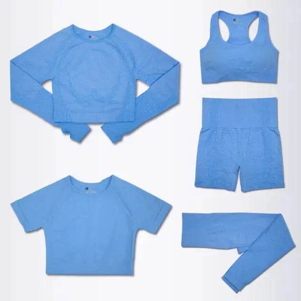 Ensemble yoga pour femmes tendance en bleu avec haut, soutien-gorge, short et legging