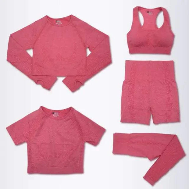 Ensemble yoga pour femmes tendance en rose avec haut, débardeur, short et legging