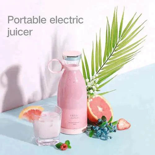 Beautysky portable blender for smoothies in pink with fruit and greenery backdrop
