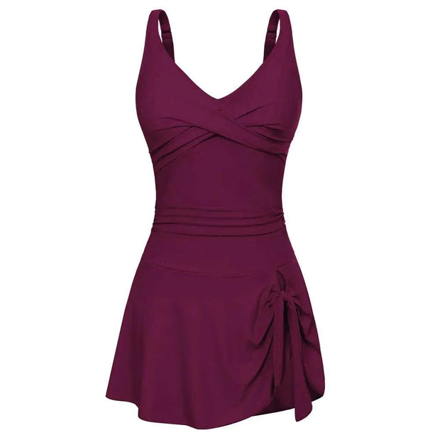 Maillot de bain élégant en bordeaux avec encolure en V et jupe drapée pour un look flatteur