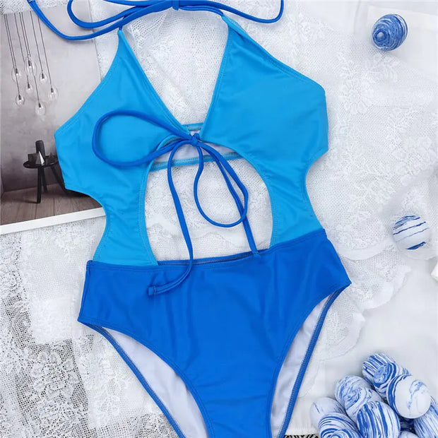 Maillot de bain une pièce skinny bleu Beautysky avec coupe ajustée et design moderne.