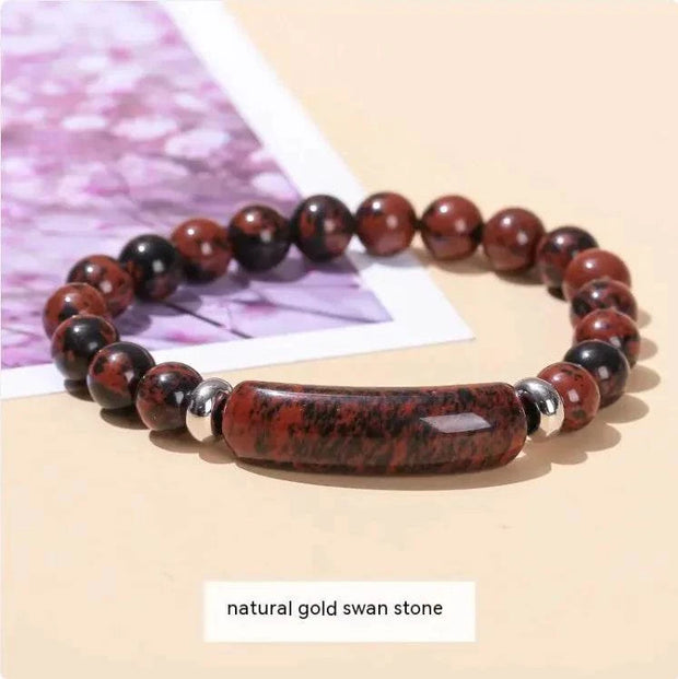 Natural gold swan stone bracelet for women with patterned beads and shimmering accents