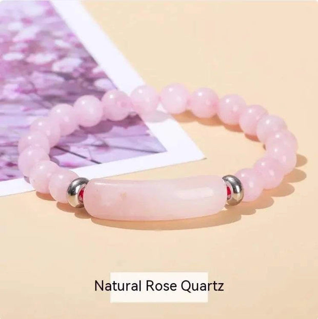 Natural stone bracelet for women made of natural rose quartz beads with silver accents