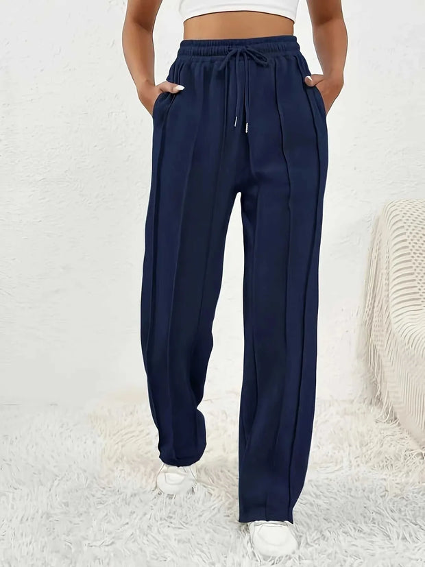 Pantalon ample femme en navy avec taille élastique et poches pour un look décontracté