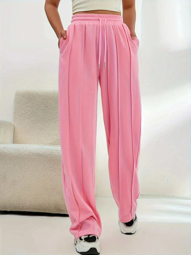 Pantalon ample femme rose avec poches et taille élastique pour un style décontracté
