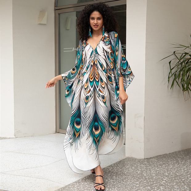 Robe bohème été femmes à motifs plumes colorées, parfaite pour les journées ensoleillées