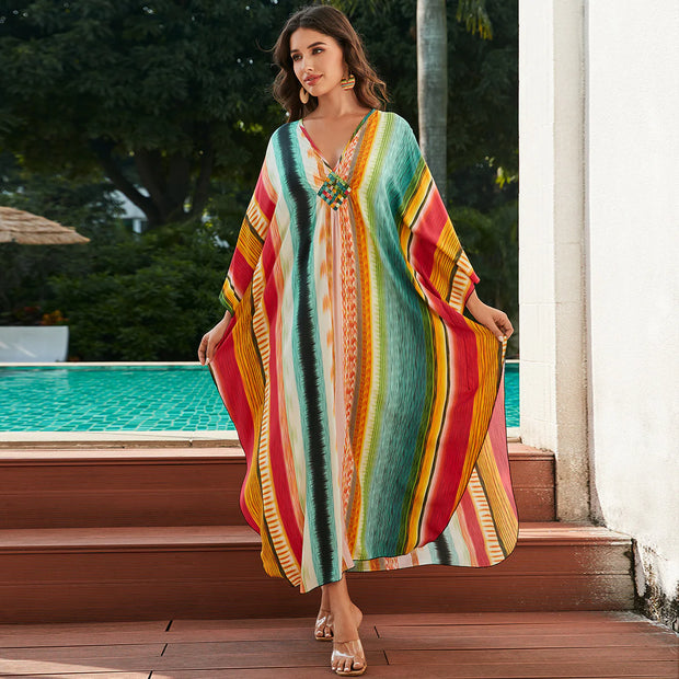 Robe bohème été femmes colorée avec des motifs vibrants, idéale pour les journées ensoleillées