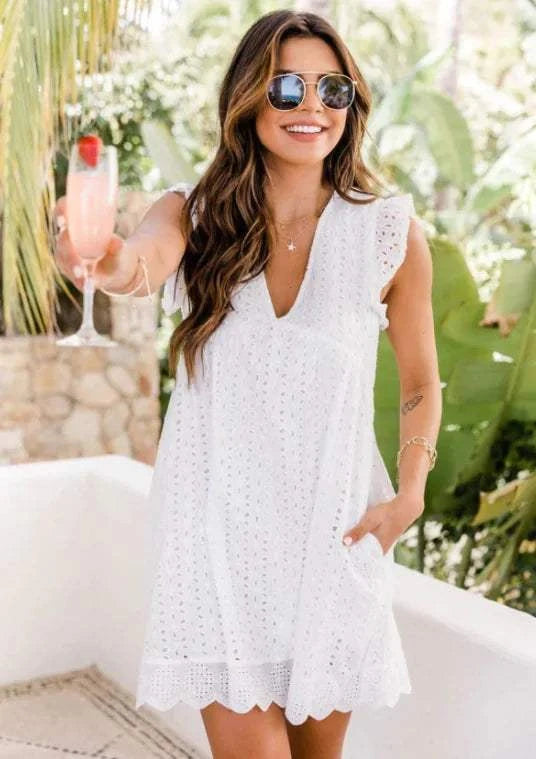 Robe casual jaune en dentelle avec une coupe élégante, idéale pour les journées ensoleillées