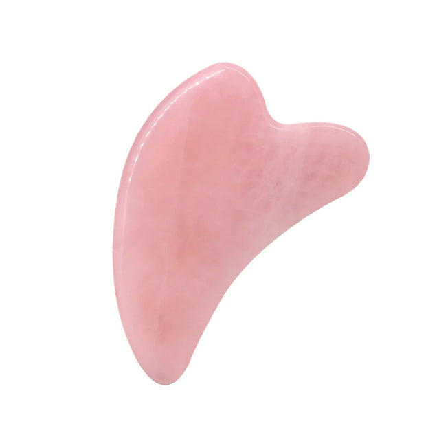 Rouleau facial jade en pierre rose pour un massage relaxant et des bienfaits pour la peau
