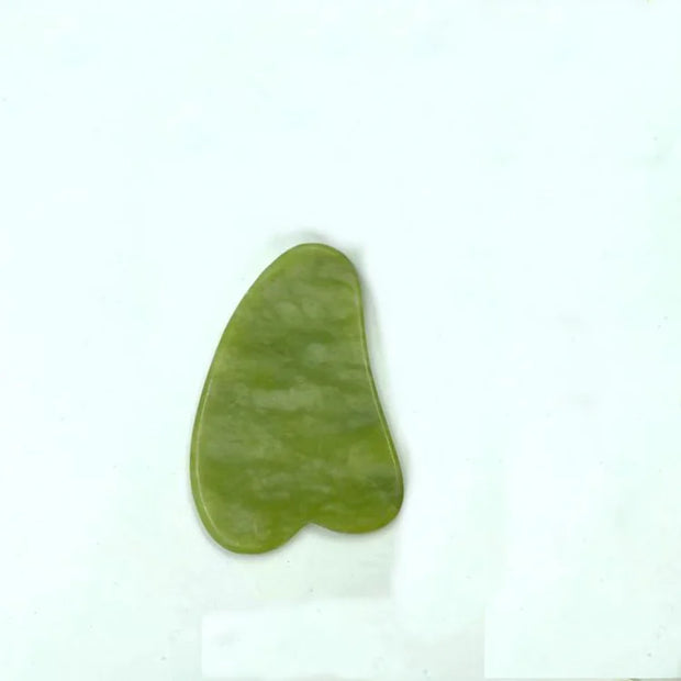 Rouleau facial jade en pierre naturelle pour un massage relaxant et raffermissant du visage