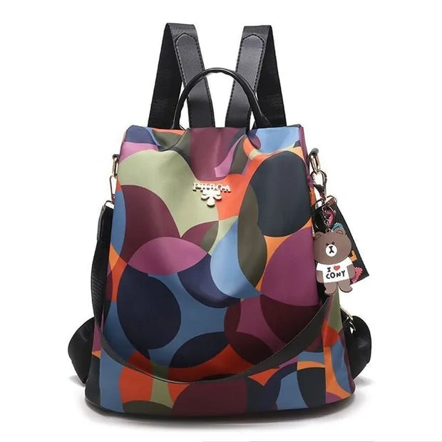 Waterproof Oxford backpack for women with colorful modern design.