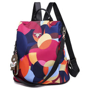 Waterproof Oxford backpack for women with colorful design and adjustable straps.