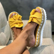 Sandales à plateforme femme en jaune avec un nœud et semelle épaisse en jute