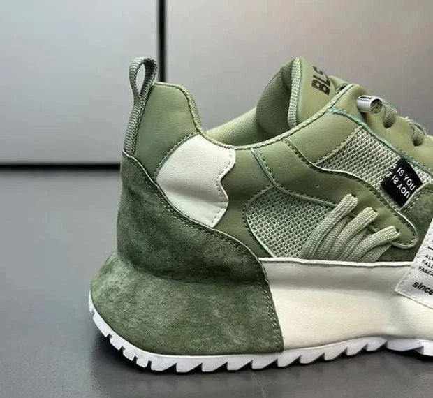 Sneakers tendance unisexes en vert avec finition en daim et semelle plate pour un style moderne