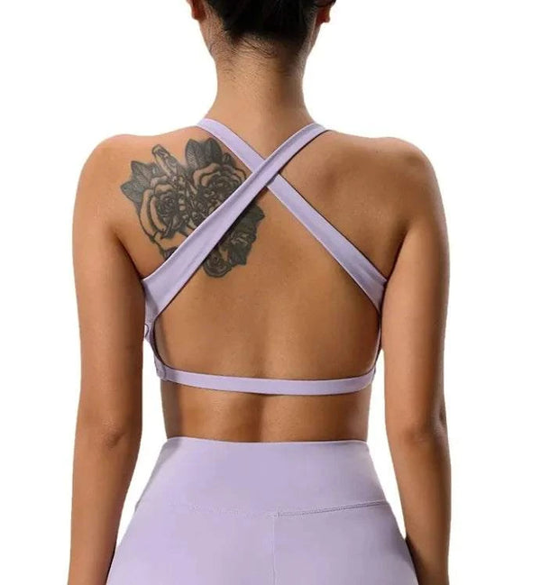 Soutien-gorge sport femme lavande avec dos croisé pour un maintien optimal lors de l'exercice