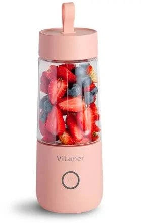 Mixeur portable à smoothie Beautysky avec des fruits frais dans le récipient transparent